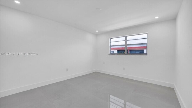 Building Photo - 6070 W 19th Ave