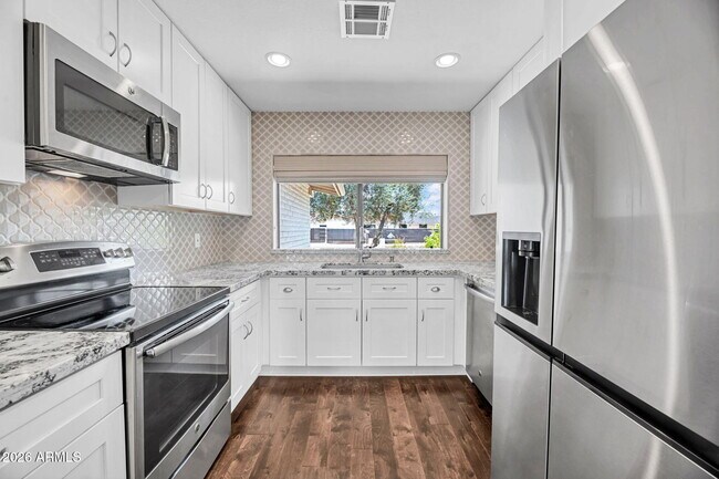 Building Photo - 5219 E Winchcomb Dr