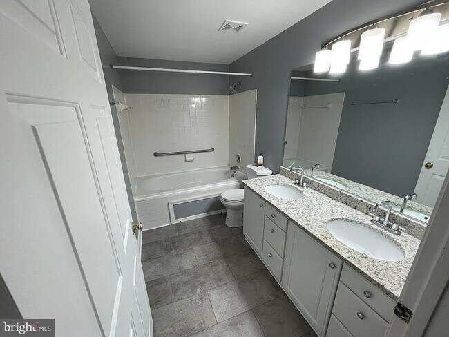 Building Photo - 8303 Bluebird Way