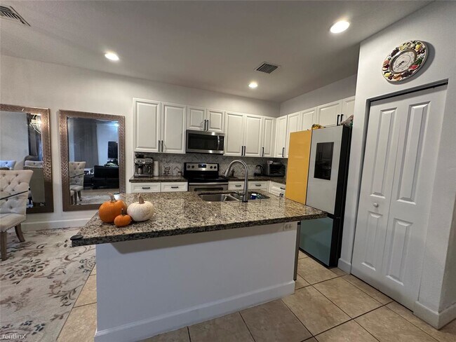 Building Photo - 4 br, 3 bath House - 4879 NW 55th Pl