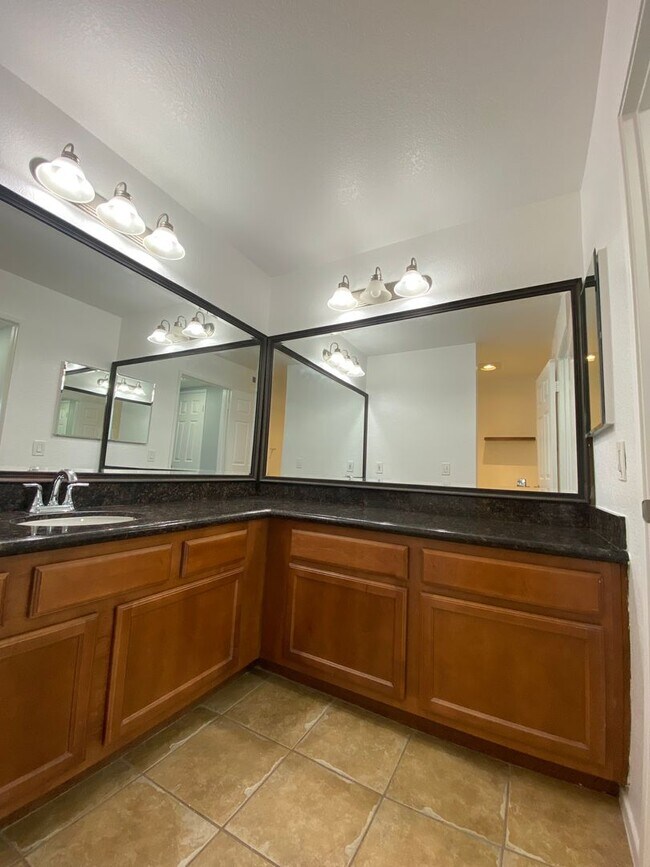 Building Photo - The Palms Condo