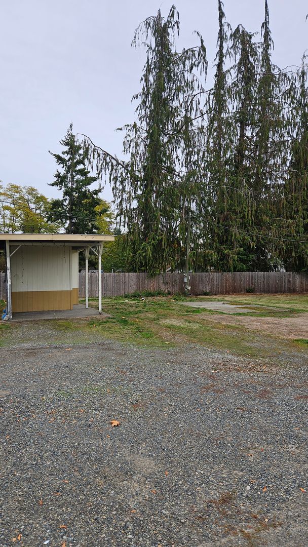 Building Photo - Lot space available with storage shed