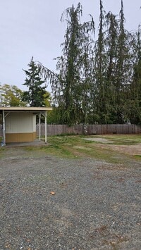 Building Photo - Lot space available with storage shed