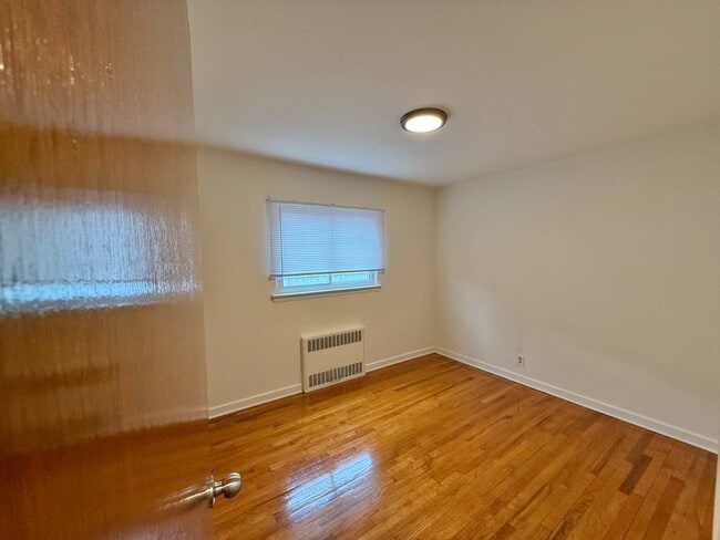 Building Photo - 203-16-203-42 42nd Ave