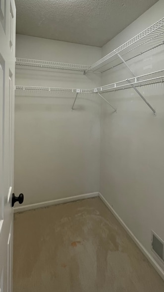 Guest bedroom walk-in closet. - 15805 24th Ave N.