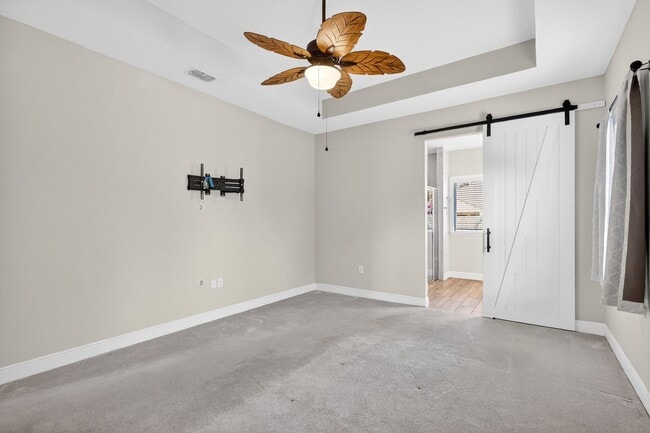 Building Photo - Modern 4-Bedroom Rental with Screened Patio & 2-Car Garage