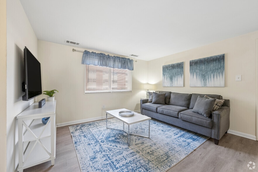 2BR, 1BA - 922SF - Living Room - Winston Apartments