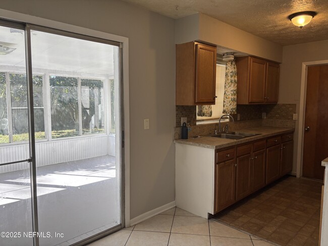 Building Photo - 7430 Jade Dr N