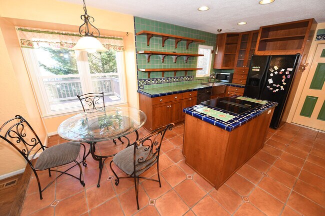 Building Photo - Gorgeous 4 BR 2+2 Baths Colonial - Finished Walk-Out Basement and Car Garage