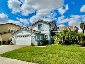 Building Photo - Coming soon! Spacious 4-Bedroom Family Hom...
