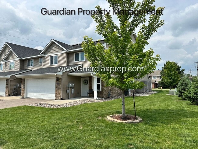 Building Photo - End Unit Town Home, Walk Out Patio, 2 Car ...