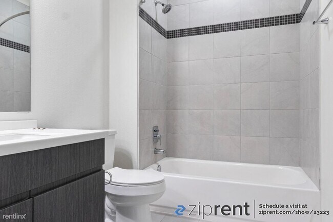 Building Photo - 2 br, 2.5 bath Townhome - 7805 Cooper Lane...