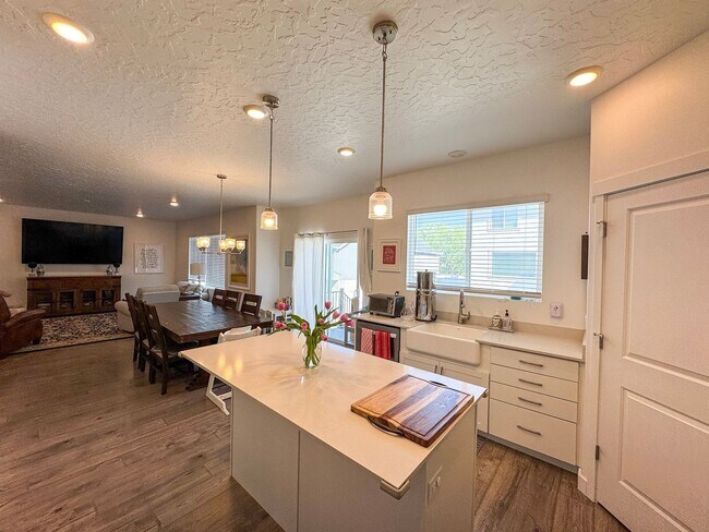 Building Photo - Modern 4 Bed / 3 Bath Home in Syracuse | Bonus Room + Fenced Yard + 86” TV Included