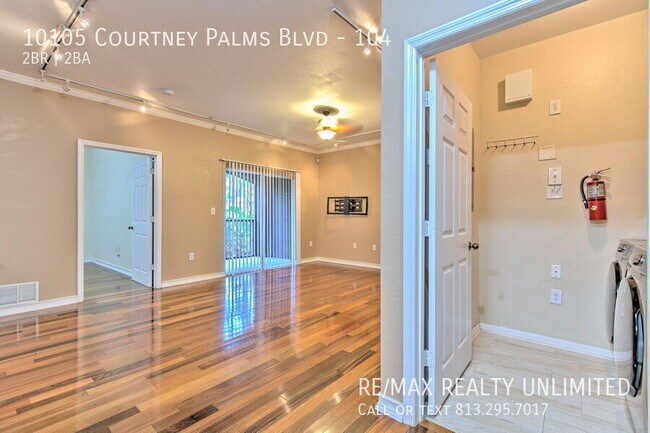 Building Photo - 10105 Courtney Palms Blvd