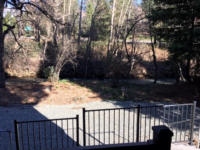 Building Photo - Creekside Frontage, Walk to town, Downstairs Apartment in Duplex