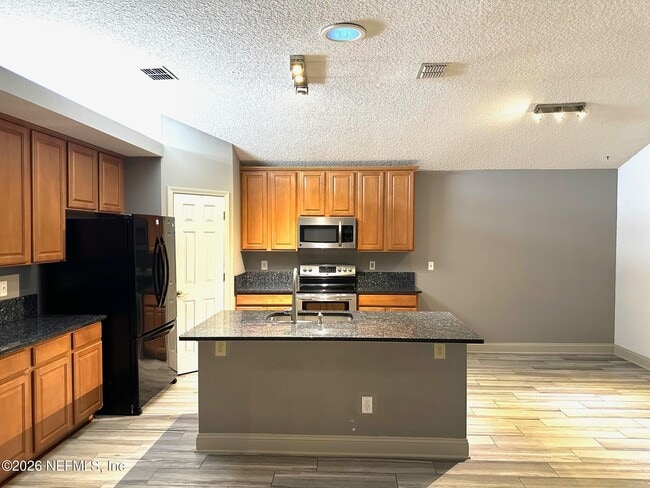 Building Photo - 5388 Hidden Gardens Dr