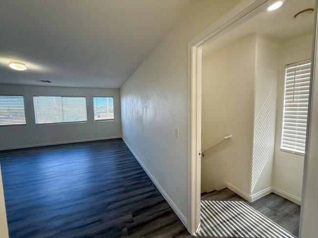 Building Photo - SPACIOUS HOME IN GATED COMMUNITY WITH POOL, RV PARKING & 4-CAR GARAGE!