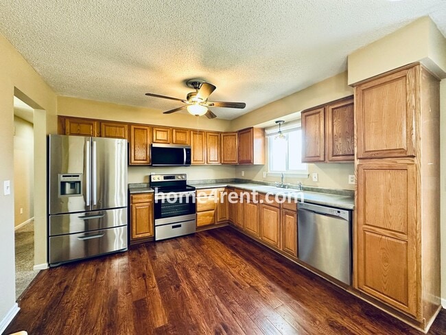 Building Photo - Beautiful, Split-Level Olathe Home w/ Stainless Steel Appliances and a Finished Basement!