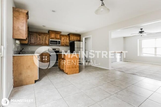 Building Photo - 411 Wiltshire Dr, Raymore, MO 64083