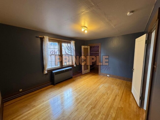 Building Photo - Charming Three-Bedroom Home with Garage and Yard