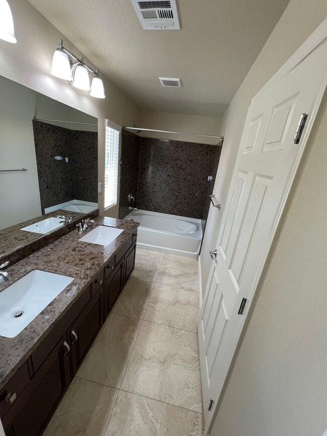 Building Photo - A Fantastic 4 Bedroom Home with the primary Downstairs, in Silverado Ranch