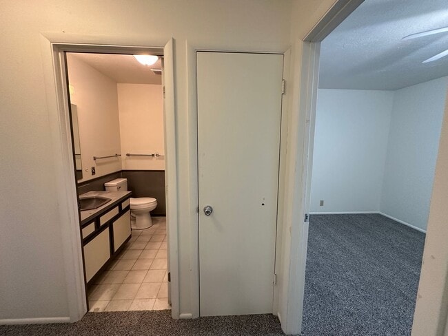 Building Photo - Spacious, three level, 4 Bed 2.5 bath Townhome in Ammon right behind the Walmart on Hitt.