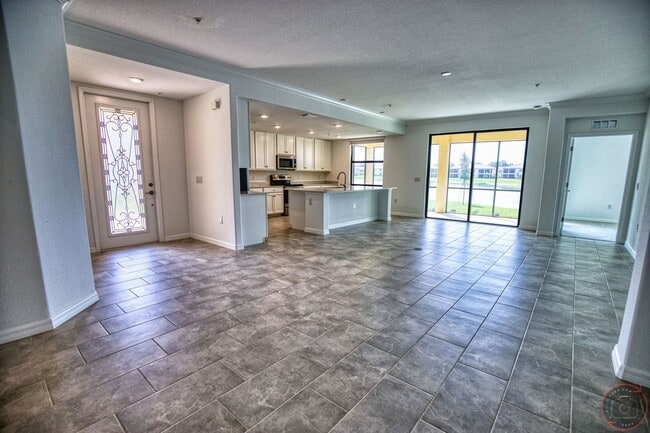 Building Photo - Annual Unfurnished Rental – New Construction Coach Home 3 Bedrooms, 2 Baths, 2 Car Garage, with R...