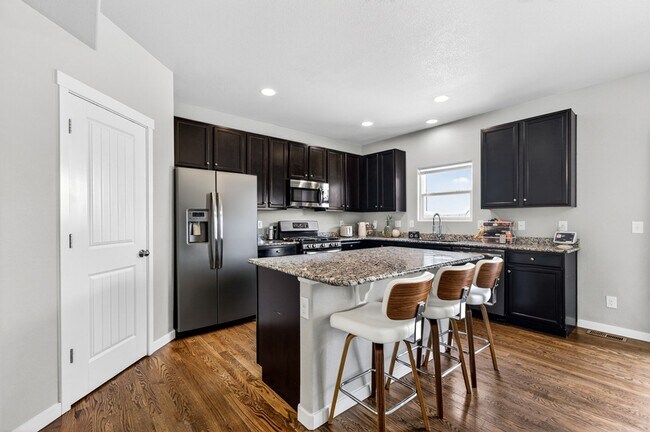 Building Photo - Upgraded 4-Bedroom Corner Lot Home with Mountain Views