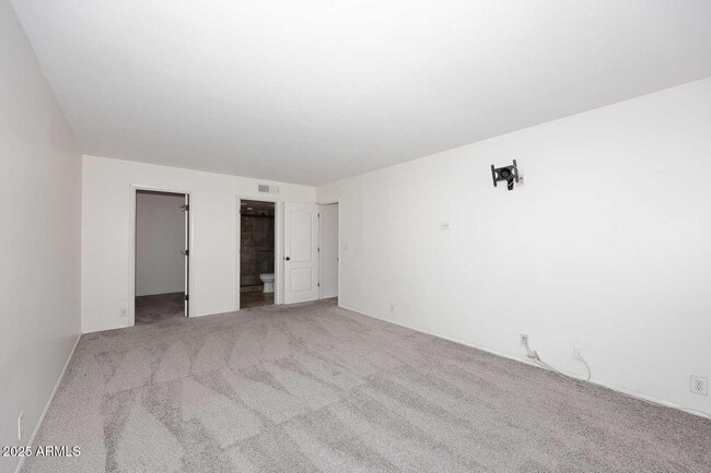 Building Photo - 7910 E Camelback Rd