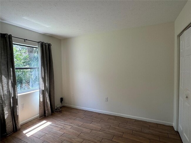 Building Photo - 9209 N Hartts Dr