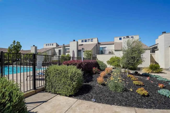 Building Photo - Spacious 1,550 Sq Ft Townhome | 2-Car Garage & High Ceilings w/ Exposed Beams