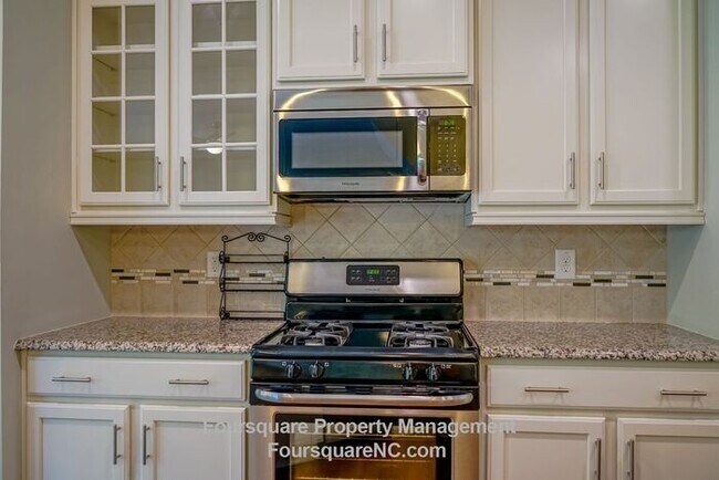 Building Photo - Charming End-Unit Townhome with Bonus Room, Screened Porch & 2-Car Garage – Convenient to RTP, RD...