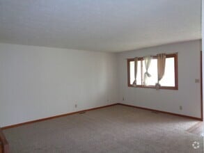 Building Photo - Spacious 3-Bedroom Home with Fenced Yard –...