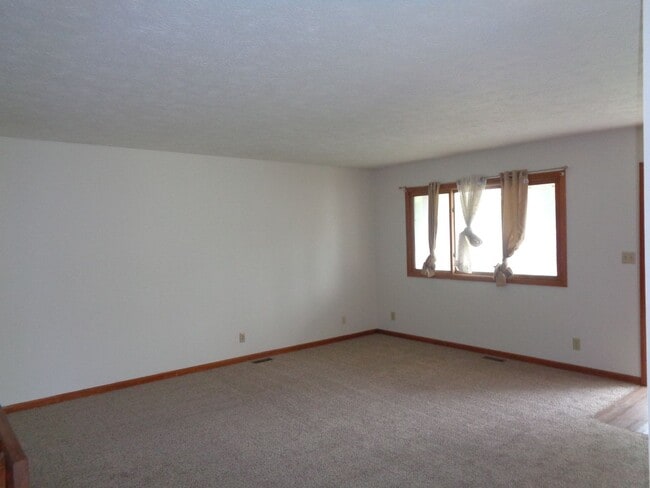 Primary Photo - Spacious 3-Bedroom Home with Fenced Yard –...