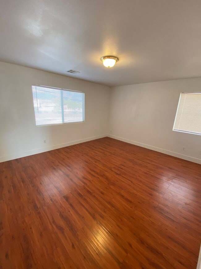 Building Photo - AMERICANA Property Mgmt - Freshly remodeled 4 beds-2 story house in the East