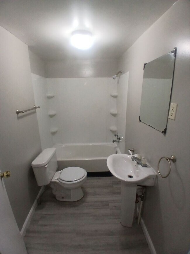 Building Photo - Completely Renovated 3 Bedroom, 2 Full Bathrooms! Front Porch & Detached Garage! 2 Living Rooms!