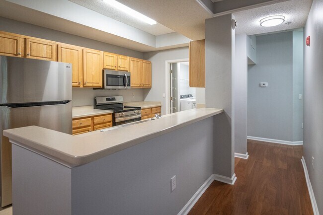 Building Photo - Available for Immediate Move in!  Gorgeous 2 Bedroom Condo with Garage on the 1st Floor!