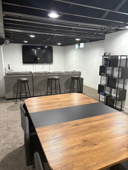 Basement with 75" TV - 3527 Hillside Dr