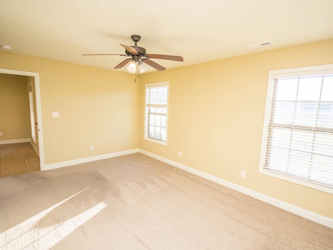 Building Photo - Minutes to Mazda Toyota and Amazon. Fenced back yard