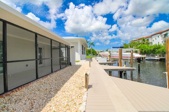 Building Photo - Unfurnished water-view with boat slip 2/2 ...