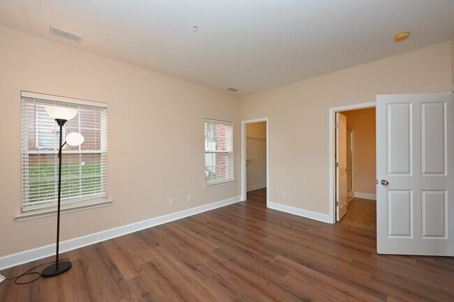 Building Photo - **PRISTINE GARDEN-LEVEL CONDO ON THE FIRST LEVEL NEAR PAVILION AND COMMUNITY GREEN SPACE**