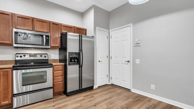 Building Photo - Spacious, light, bright 2 Master BR, 2-car...