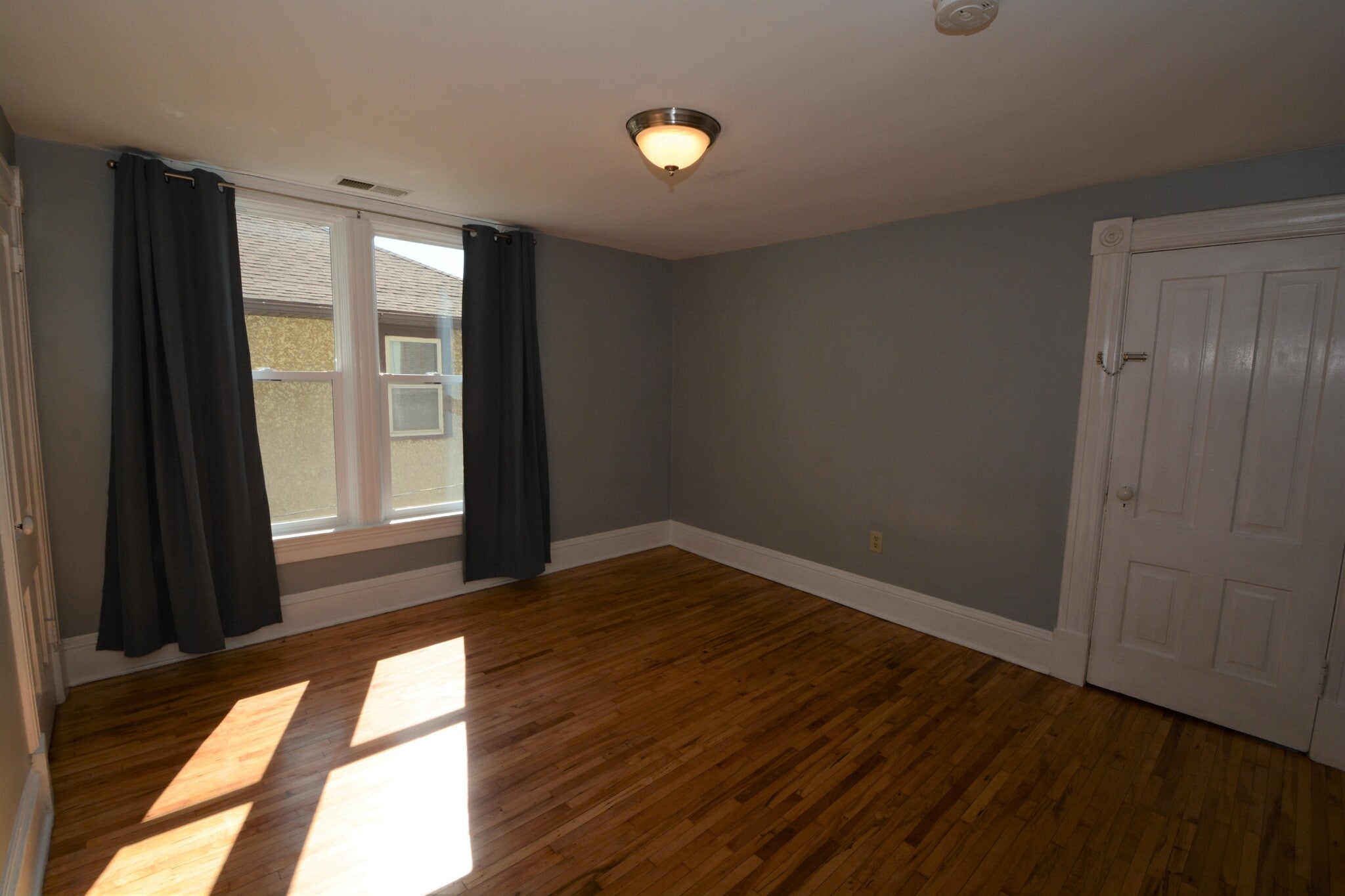 Bedroom 1 with walk in closet - 1100 15th Ave SE