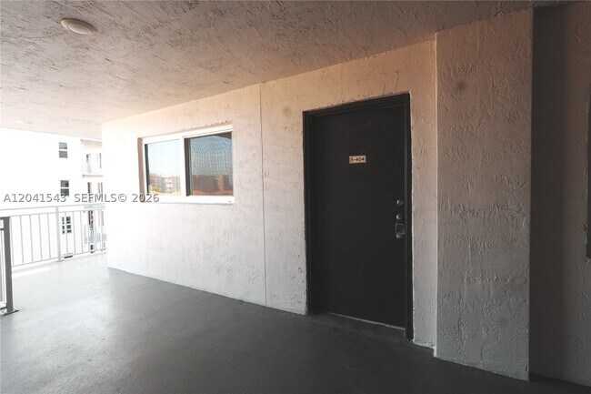 Building Photo - 9915 W Okeechobee Rd