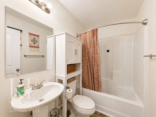 Building Photo - Spacious 3-Story Home with Flexible Living Space, Heat Pump & Private Deck Retreat