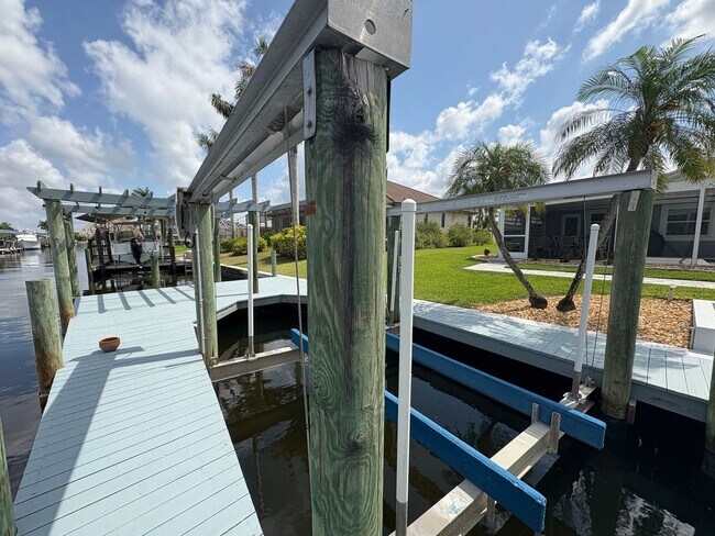 Building Photo - Beautifully Furnished Pool Home with Boat ...