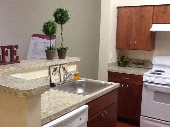 Breakfast Bar in Kitchen - Victory Square Senior Apartments