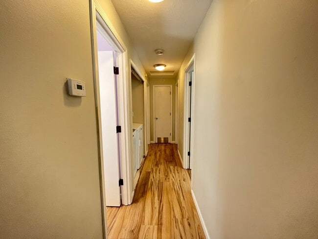 Building Photo - This Adorable 3 Bed / 2.5 Bath Ranch Style Homes Offers A Large Backyard and Beautiful Natural Li...