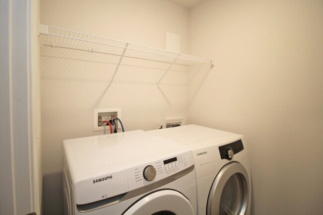 Building Photo - 4-Bedroom Rental in Lakeshore Preserve – Open Floor Plan, Screened Patio, and 2-Car Garage