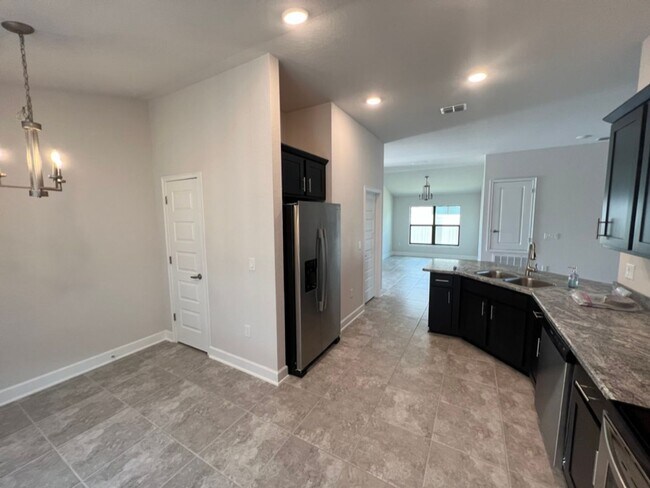 Building Photo - Rent this brand-new home in Davenport today!